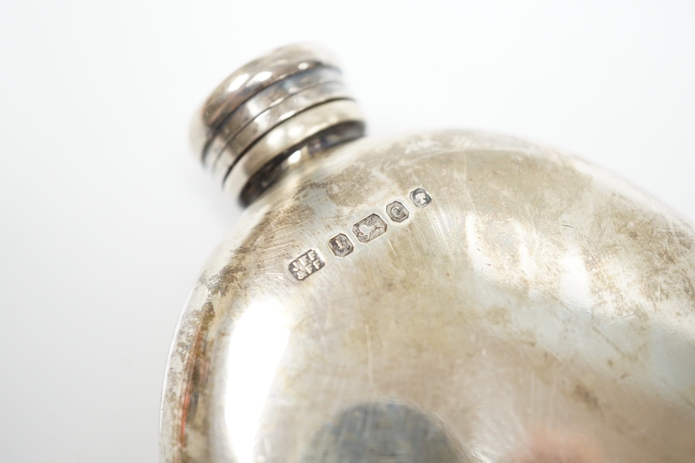 A Victorian silver oval hip flask, Fenton Brothers, Sheffield, 1874, 12.5cm, 6.3oz.